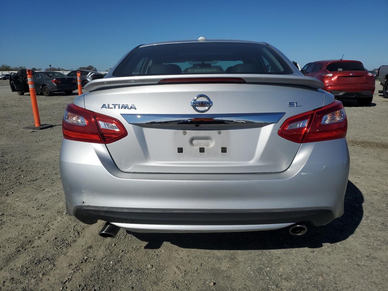 2016 Nissan Altima VIN 1N4AL3AP5GC263639 Copart auction photo, minor dent/scratches damage thumbnail 6