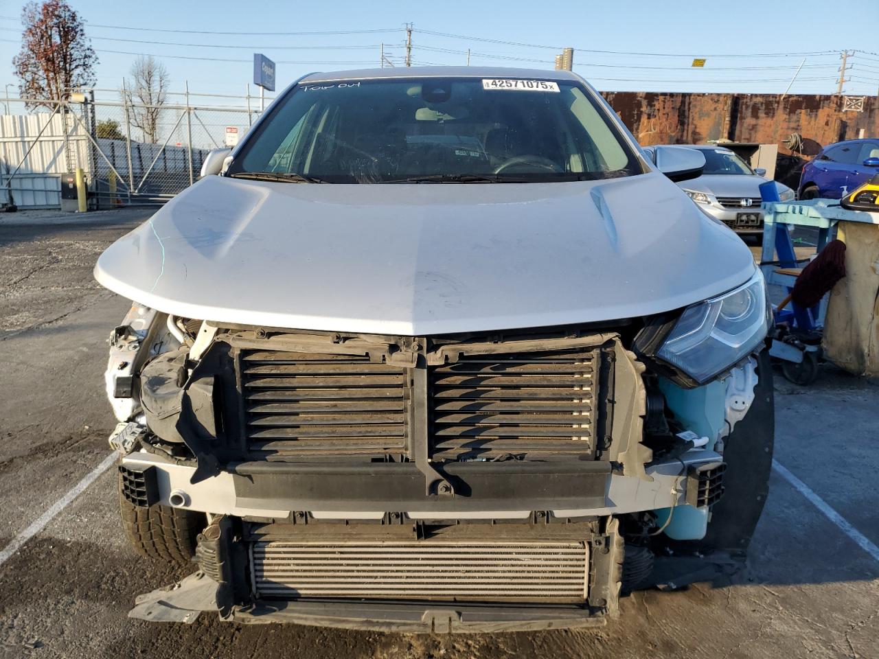 2021 Chevrolet Equinox VIN 3GNAXUEV2MS133599 Copart auction photo, front end damage thumbnail 5