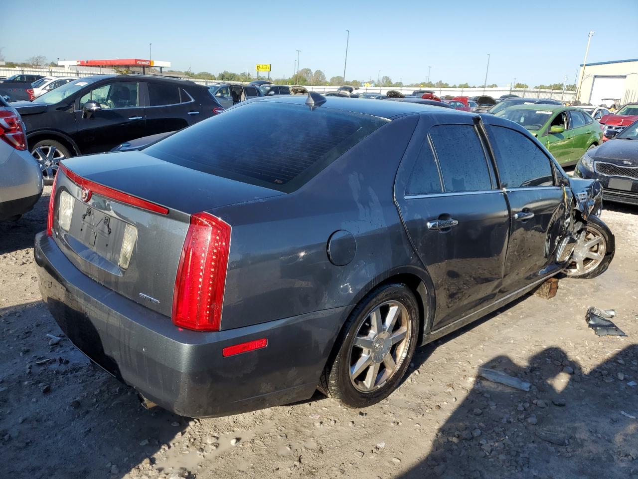 2009 Cadillac STS VIN 1G6DW67V390104597 Copart auction photo, front end / side damage thumbnail 3