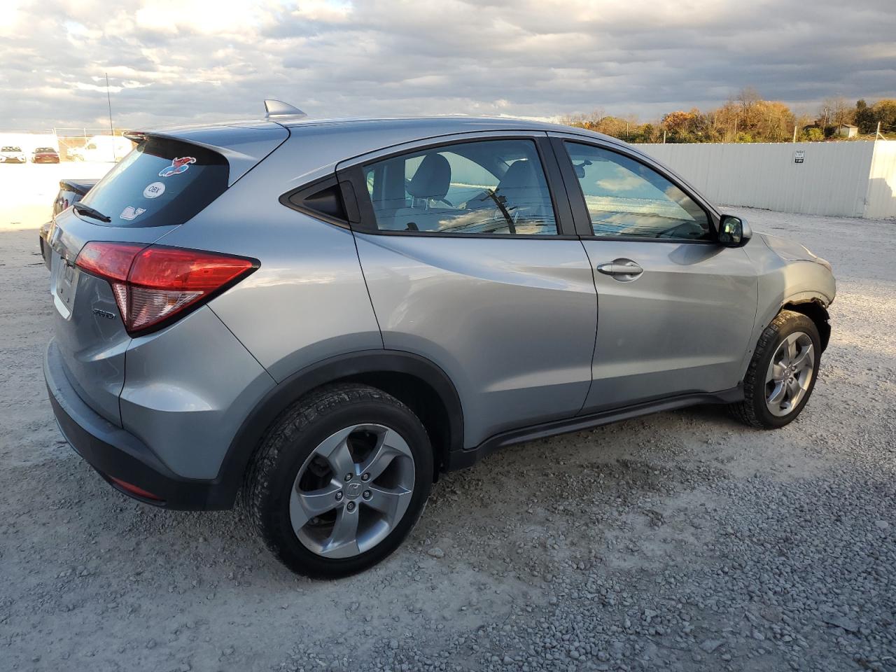 2017 Honda HR-V VIN 3CZRU6H33HG704126 Copart auction photo, front end / side damage thumbnail 3