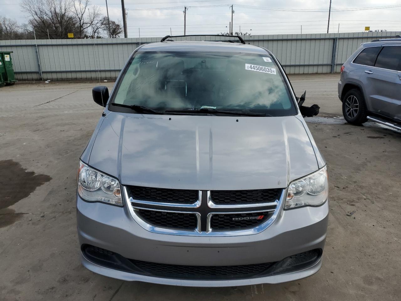 2016 Dodge Caravan VIN 2C4RDGBG5GR244337 Copart auction photo, vandalism damage thumbnail 5