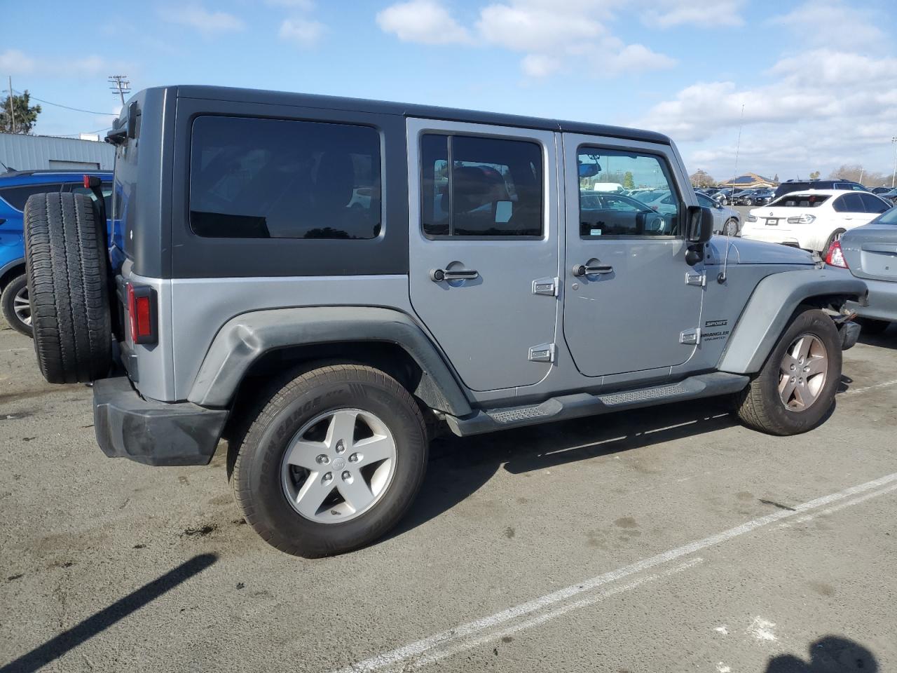 2015 Jeep Wrangler VIN 1C4BJWDG9FL551339 Copart auction photo, minor dent/scratches damage thumbnail 3