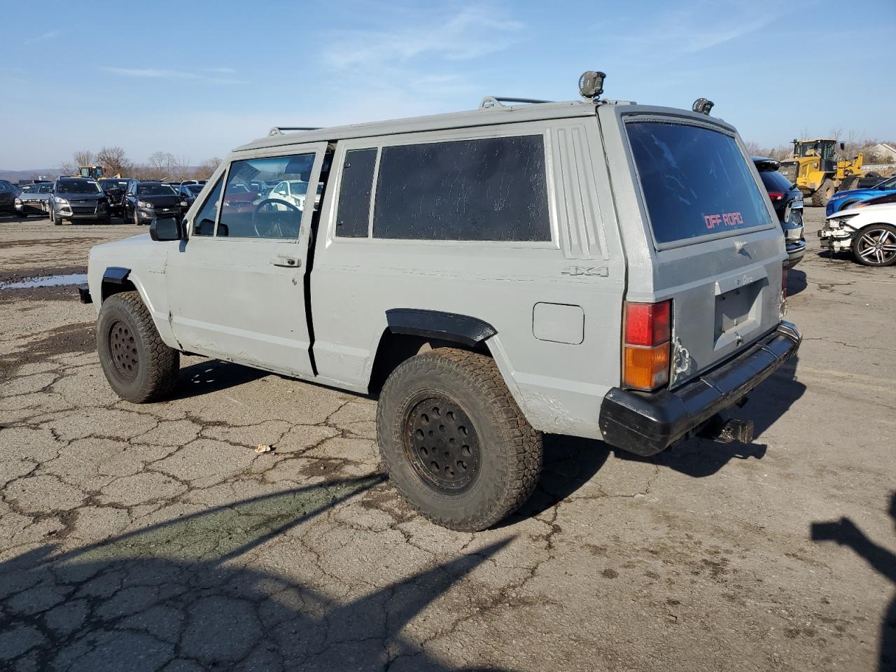1990 Jeep Grand Cherokee VIN 1J4FJ87L2LL112530 Copart auction photo, side damage thumbnail 2