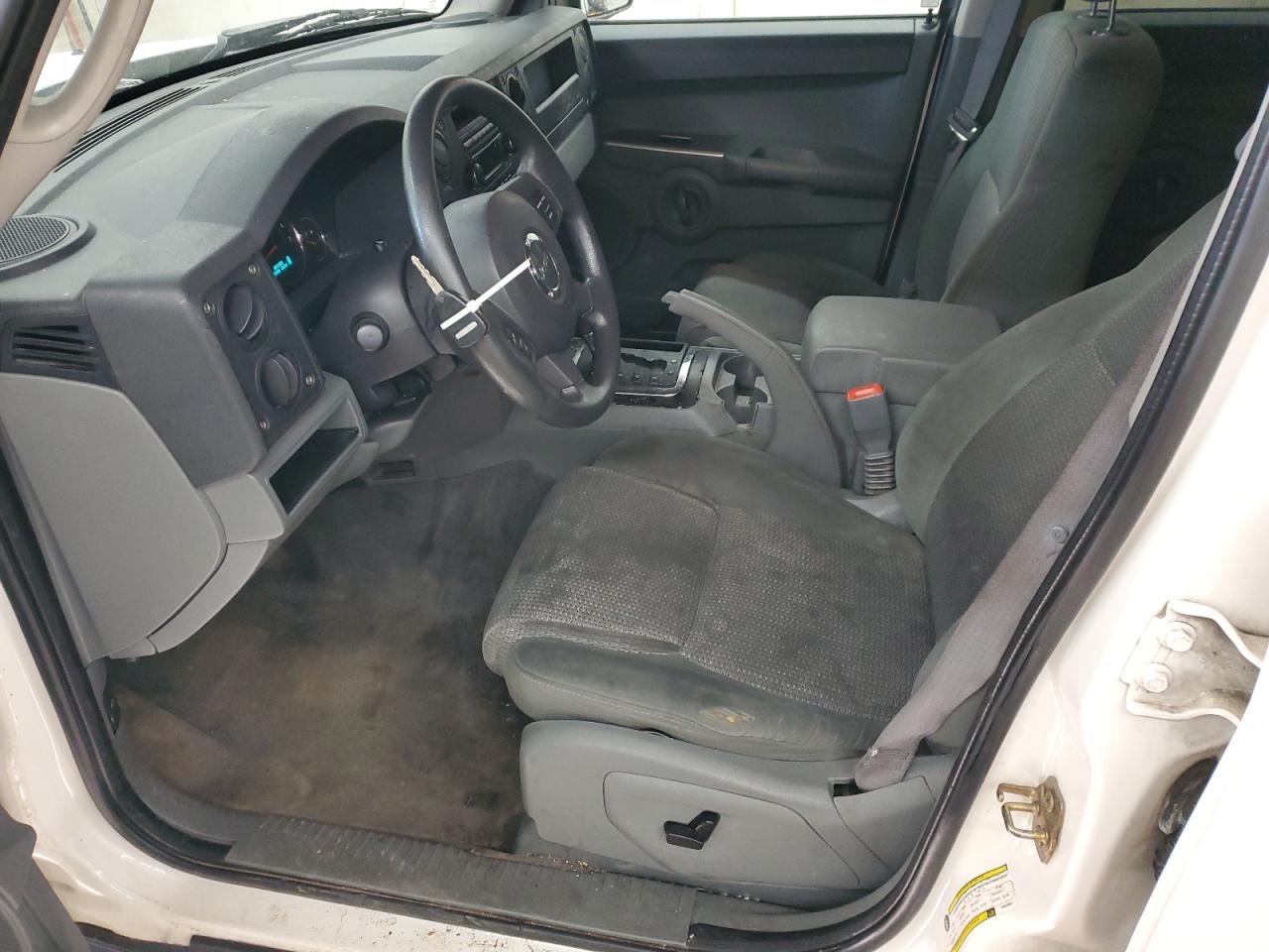 2007 Jeep Commander VIN 1J8HG48K37C658831 Copart auction photo, front end / side damage thumbnail 7
