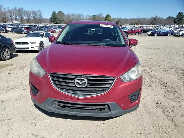 2016 Mazda CX-5 VIN JM3KE2BY0G0784397 Copart auction photo, hail / minor dent/scratches damage thumbnail 12