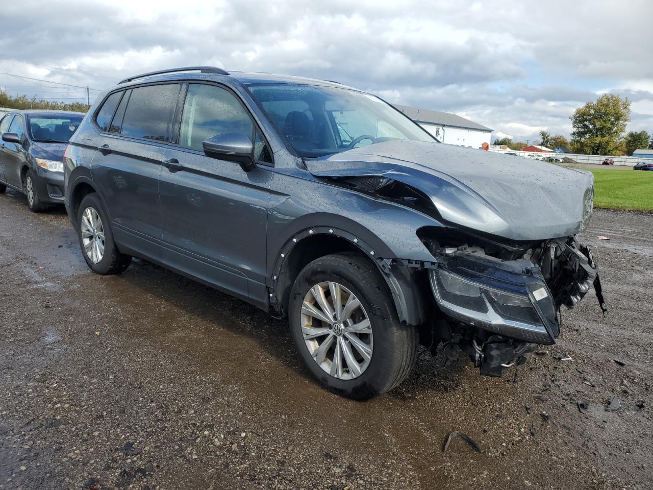 2020 Volkswagen Tiguan VIN 3VV0B7AX7LM142993 Copart auction photo, front end / side damage thumbnail 4