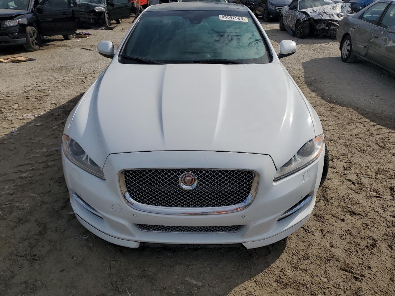 2015 Jaguar XJ VIN SAJWA1CZ9F8V88418 Copart auction photo, side damage thumbnail 5