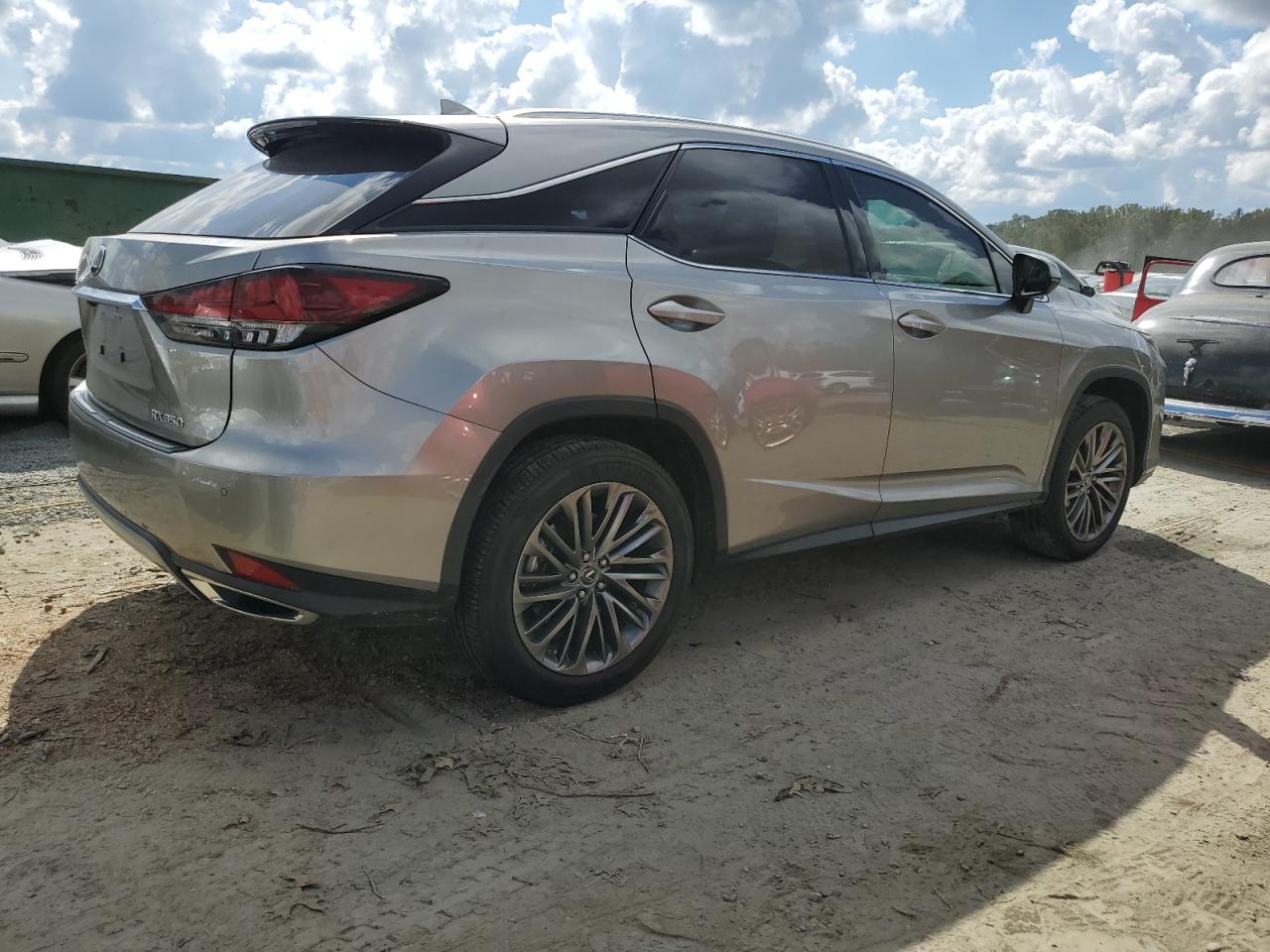 2020 Lexus RX VIN 2T2JZMAA3LC167550 Copart auction photo, side / minor dent/scratches damage thumbnail 3