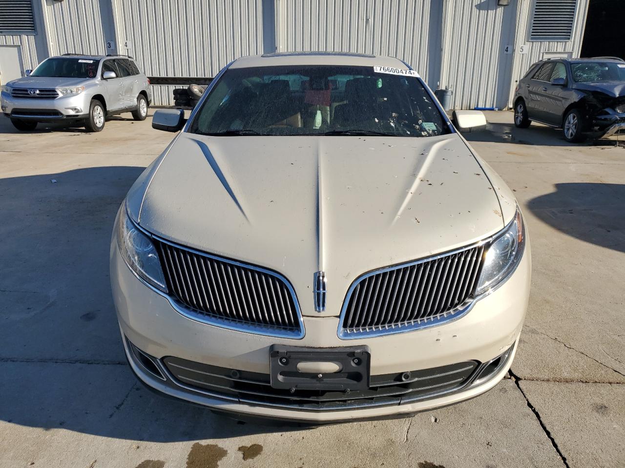 2015 Lincoln MKS VIN 1LNHL9EK5FG601425 Copart auction photo, side damage thumbnail 5