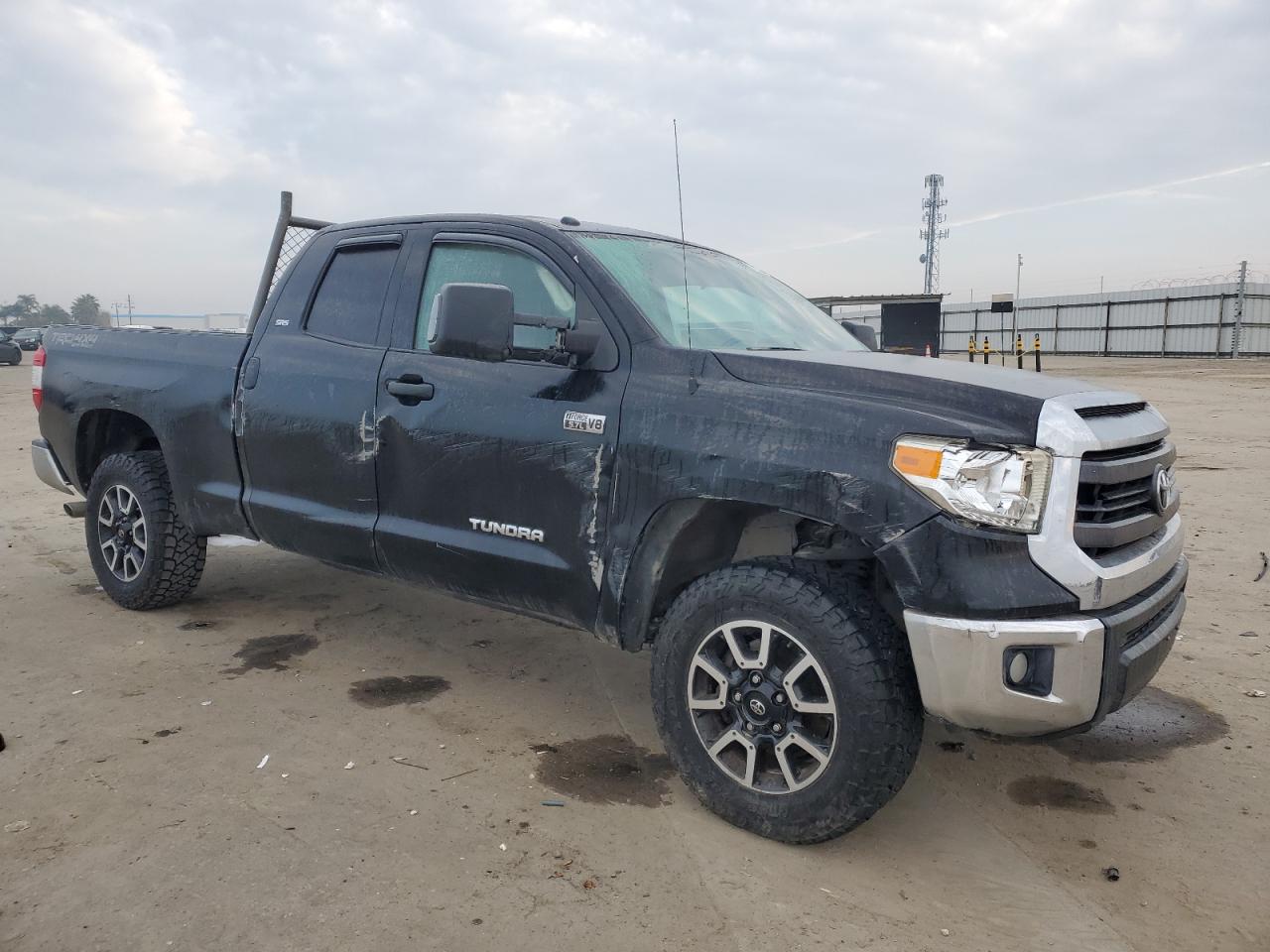 2014 Toyota Tundra VIN 5TFUY5F10EX401649 Copart auction photo, all over damage thumbnail 4