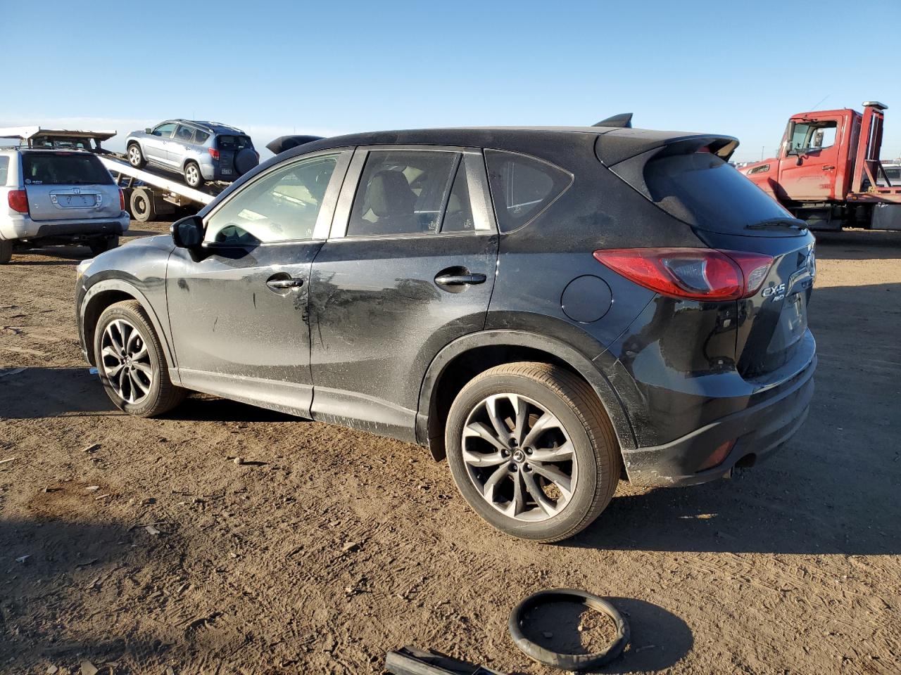 2016 Mazda CX-5 VIN JM3KE4DY0G0731384 Copart auction photo, side damage thumbnail 2