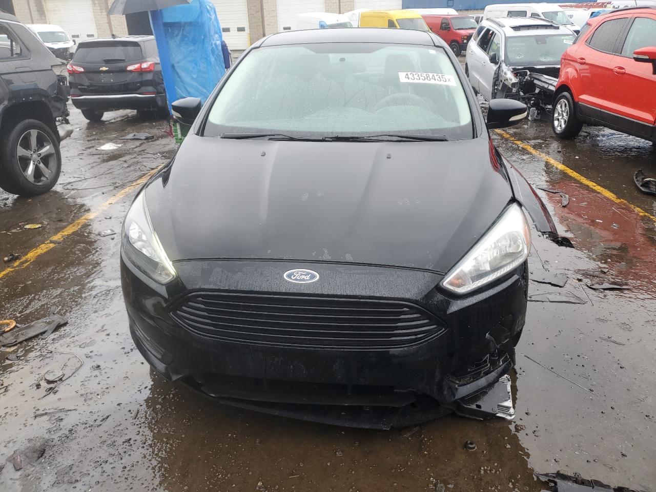 2016 Ford Focus VIN 1FADP3FE0GL215829 Copart auction photo, front end damage thumbnail 5