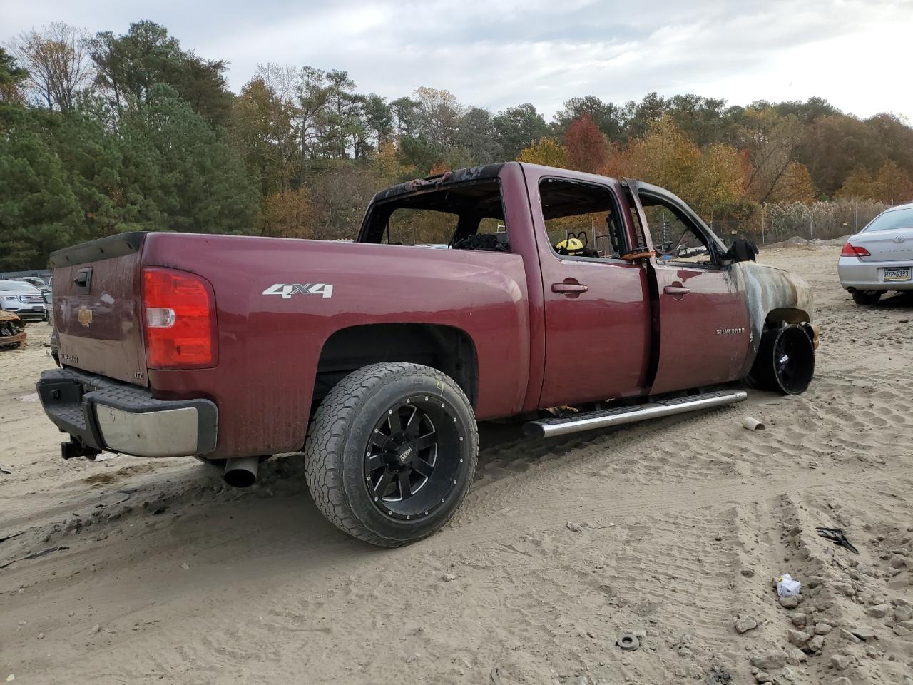 2013 Chevrolet Silverado VIN 3GCPKTE79DG256235 Copart auction photo, burn damage thumbnail 3