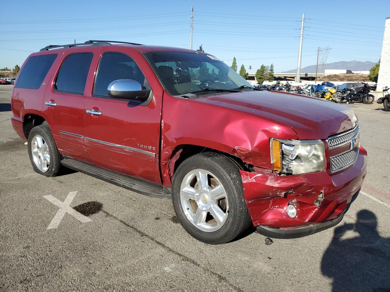 2011 Chevrolet Tahoe VIN 1GNSCCE03BR194409 Copart auction photo, front end / side damage thumbnail 4