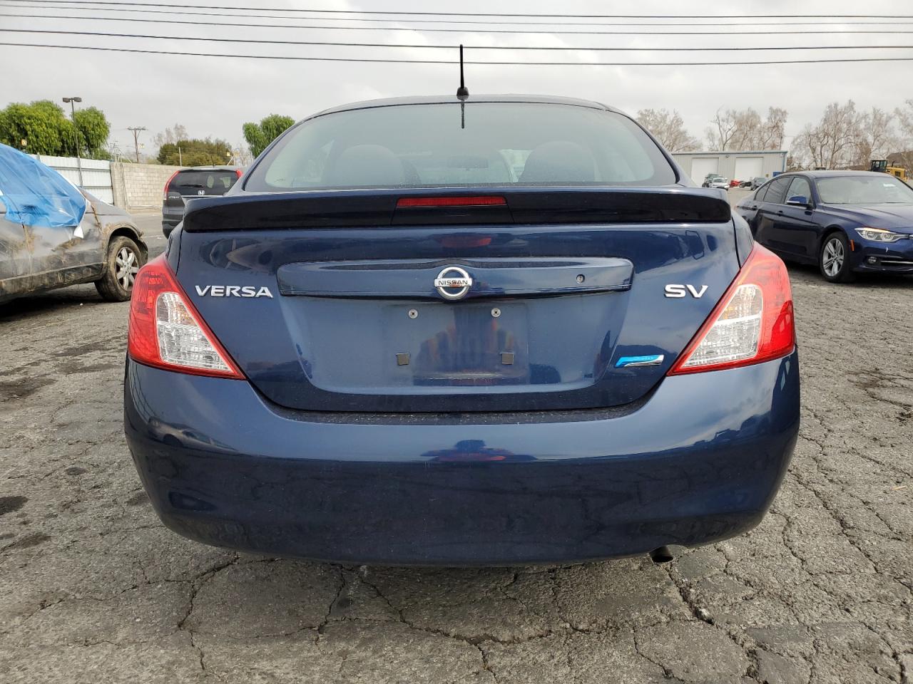 2014 Nissan Versa VIN 3N1CN7AP7EL816221 Copart auction photo, front end damage thumbnail 6