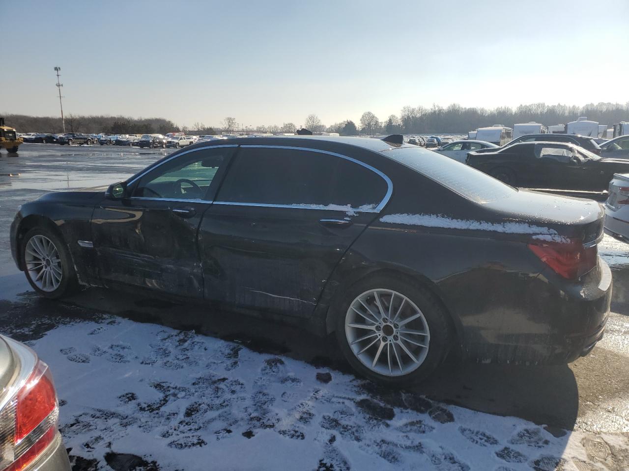 2013 BMW 7er VIN WBAYF8C55DD141360 Copart auction photo, side damage thumbnail 2