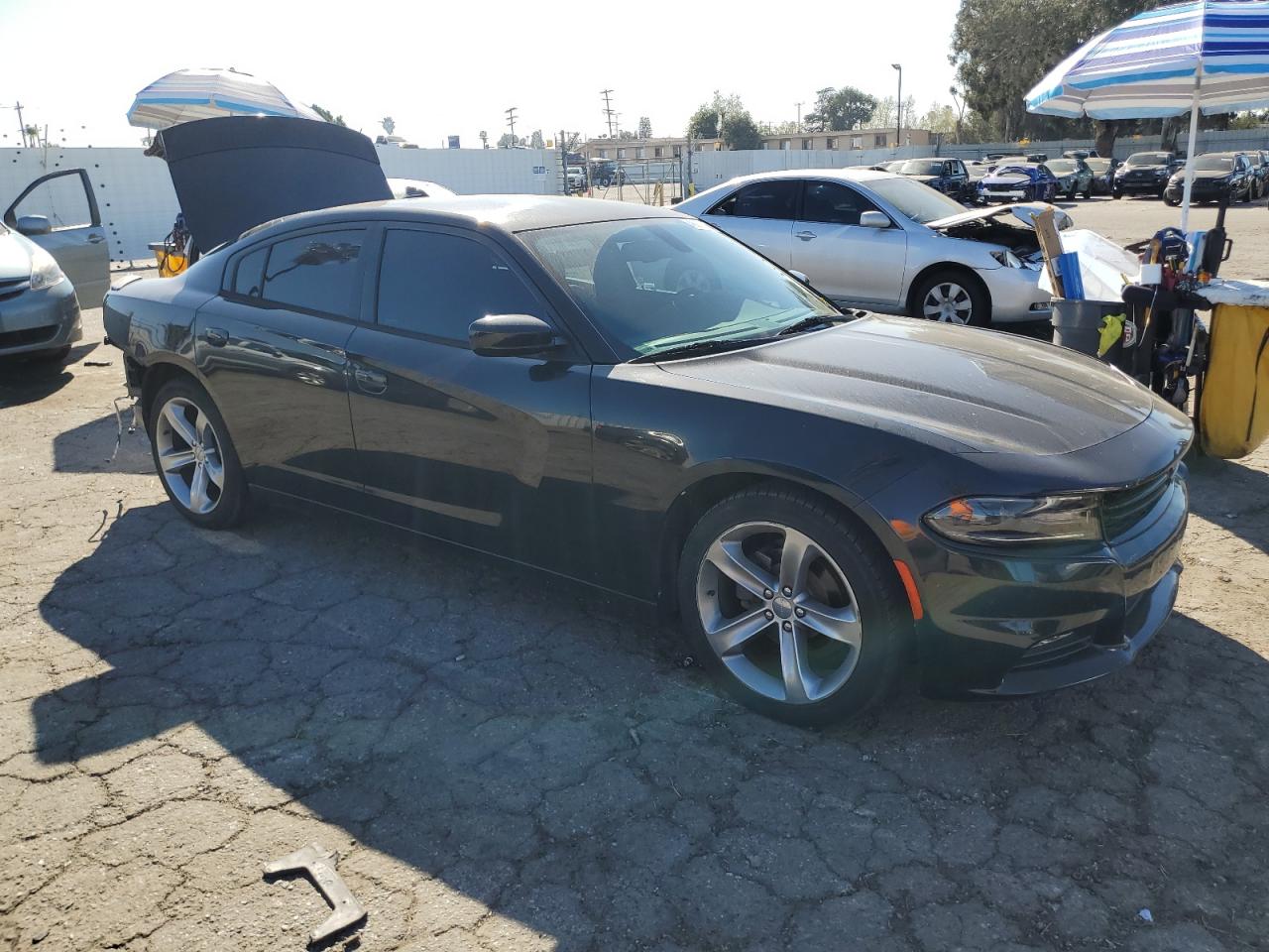2015 Dodge Charger VIN 2C3CDXHG7FH727799 Copart auction photo, rear end / minor dent/scratches damage thumbnail 4