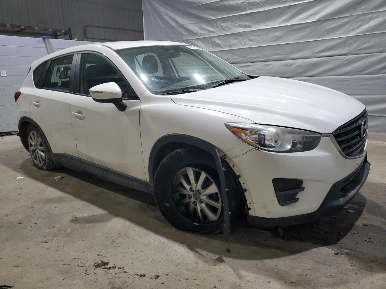 2016 Mazda CX-5 VIN JM3KE4BYXG0778960 Copart auction photo, front end / mechanical damage thumbnail 4