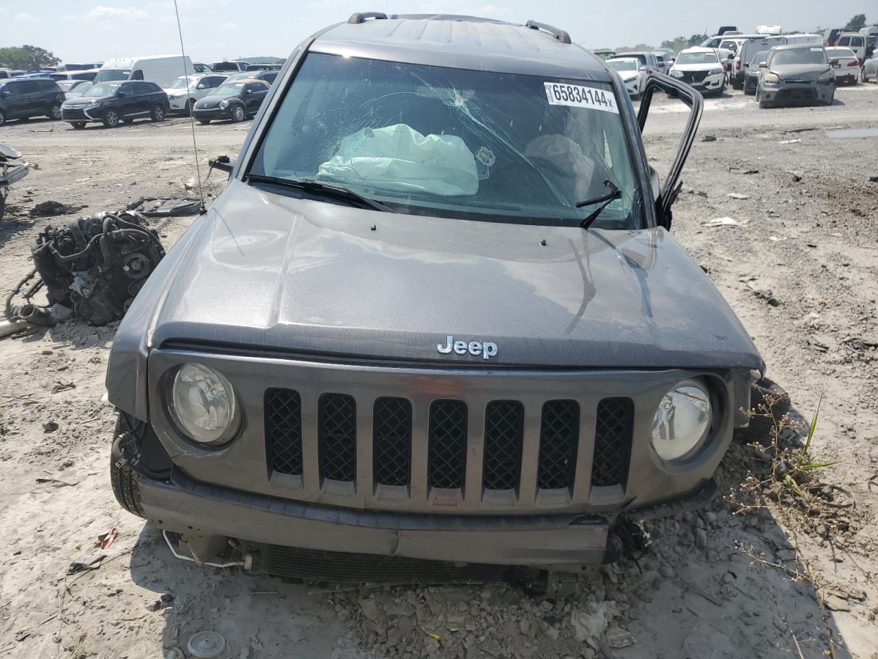2016 Jeep Liberty (Patriot) VIN 1C4NJRFB2GD598997 Copart auction photo, all over damage thumbnail 5