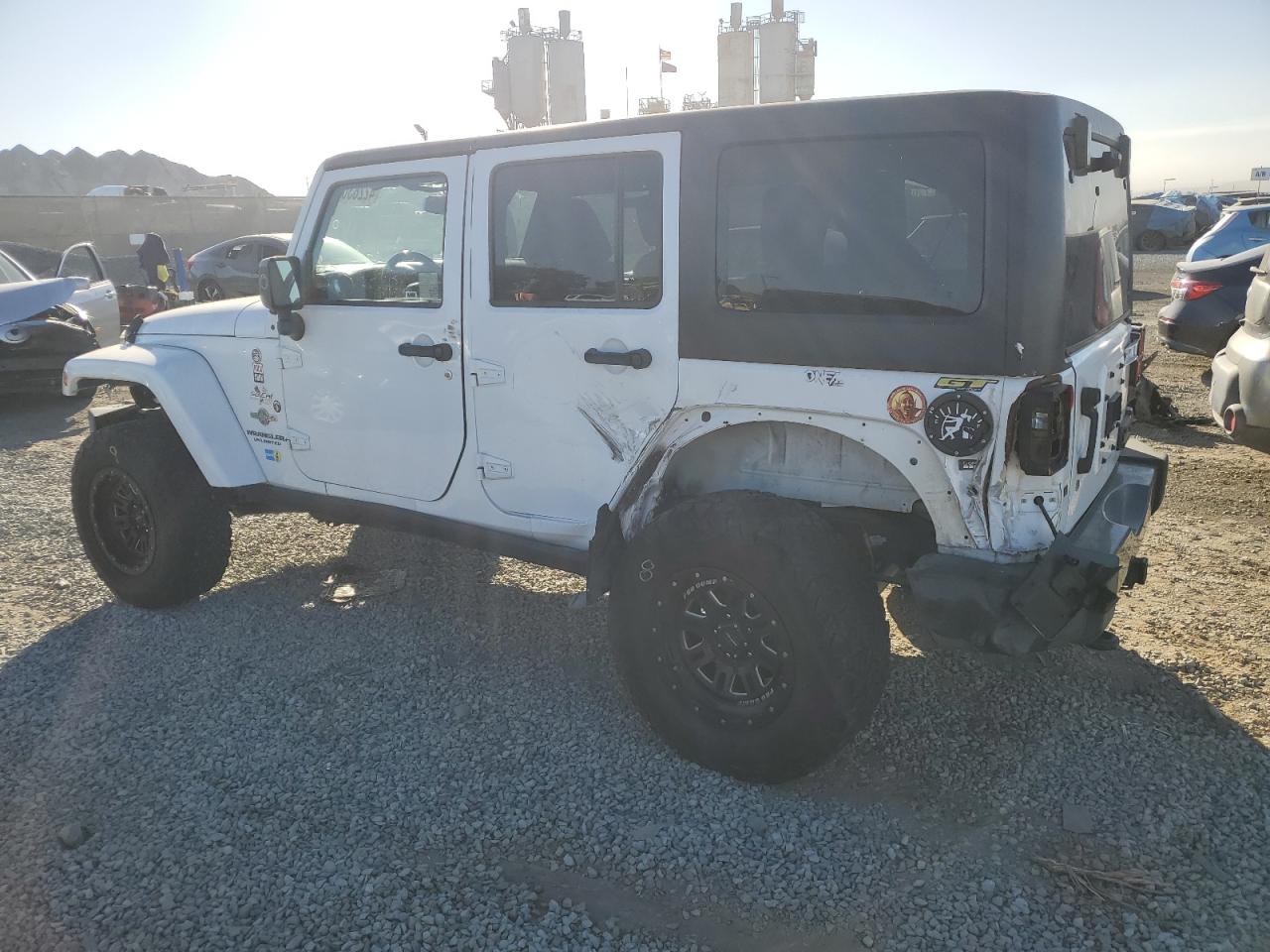 2015 Jeep Wrangler VIN 1C4HJWDG2FL614713 Copart auction photo, all over damage thumbnail 2