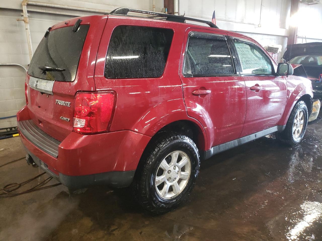 2010 Mazda Tribute VIN 4F2CY9GG8AKM07504 Copart auction photo, front end / minor dent/scratches damage thumbnail 3