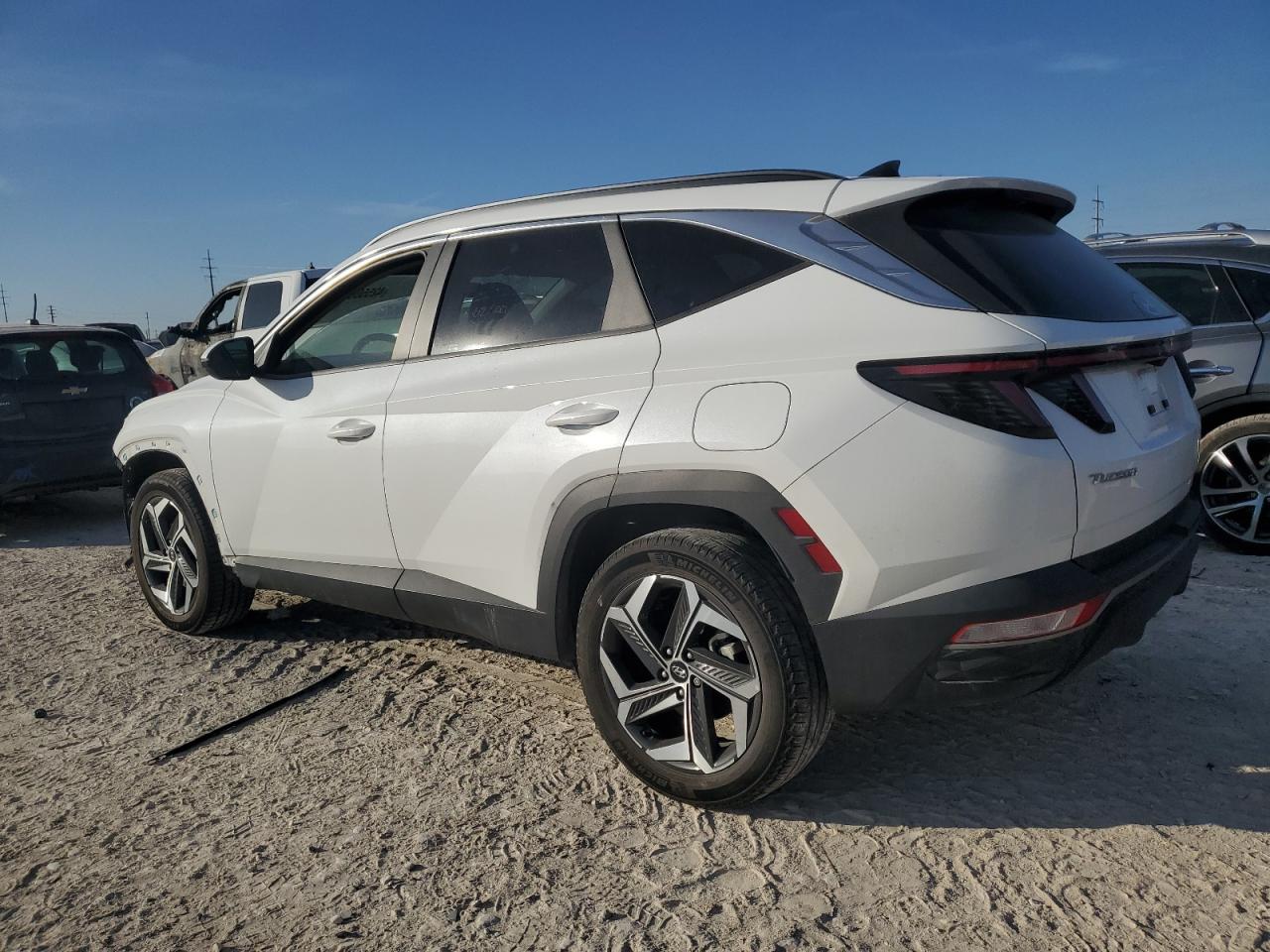 2022 Hyundai Tucson VIN 5NMJFCAE9NH068125 Copart auction photo, front end / side damage thumbnail 2
