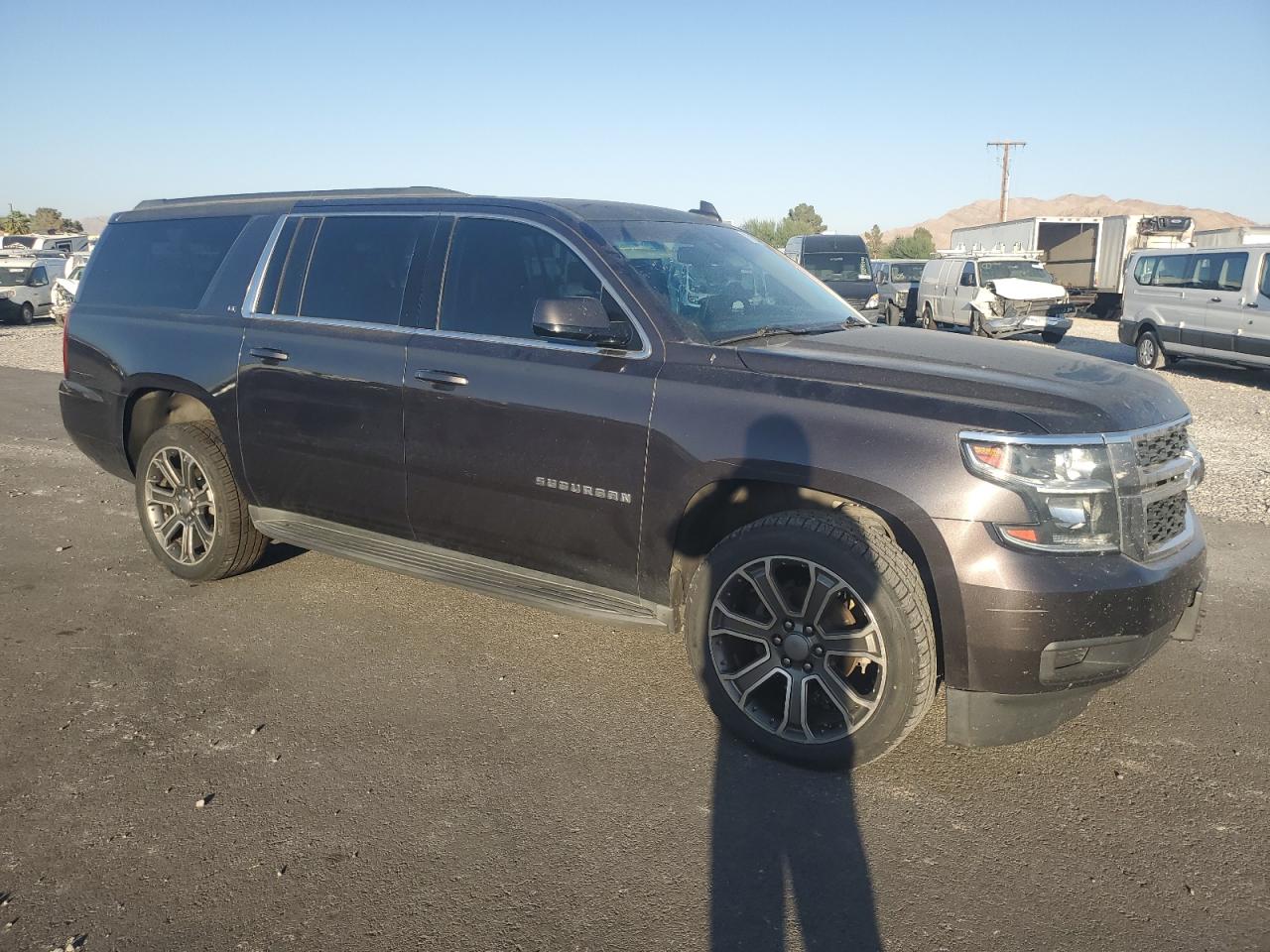 2016 Chevrolet Suburban VIN 1GNSKHKC8GR220038 Copart auction photo, minor dent/scratches damage thumbnail 4