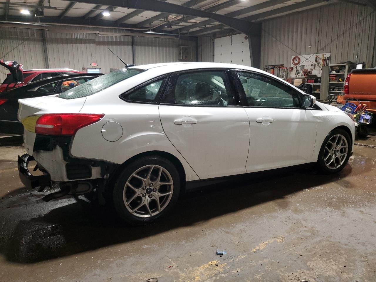 2015 Ford Focus VIN 1FADP3F23FL274054 Copart auction photo, rear end damage thumbnail 3