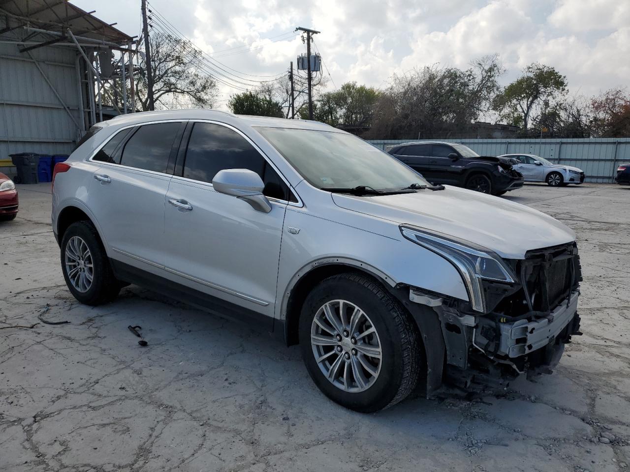 2017 Cadillac XT5 VIN 1GYKNBRS9HZ133903 Copart auction photo, all over damage thumbnail 4