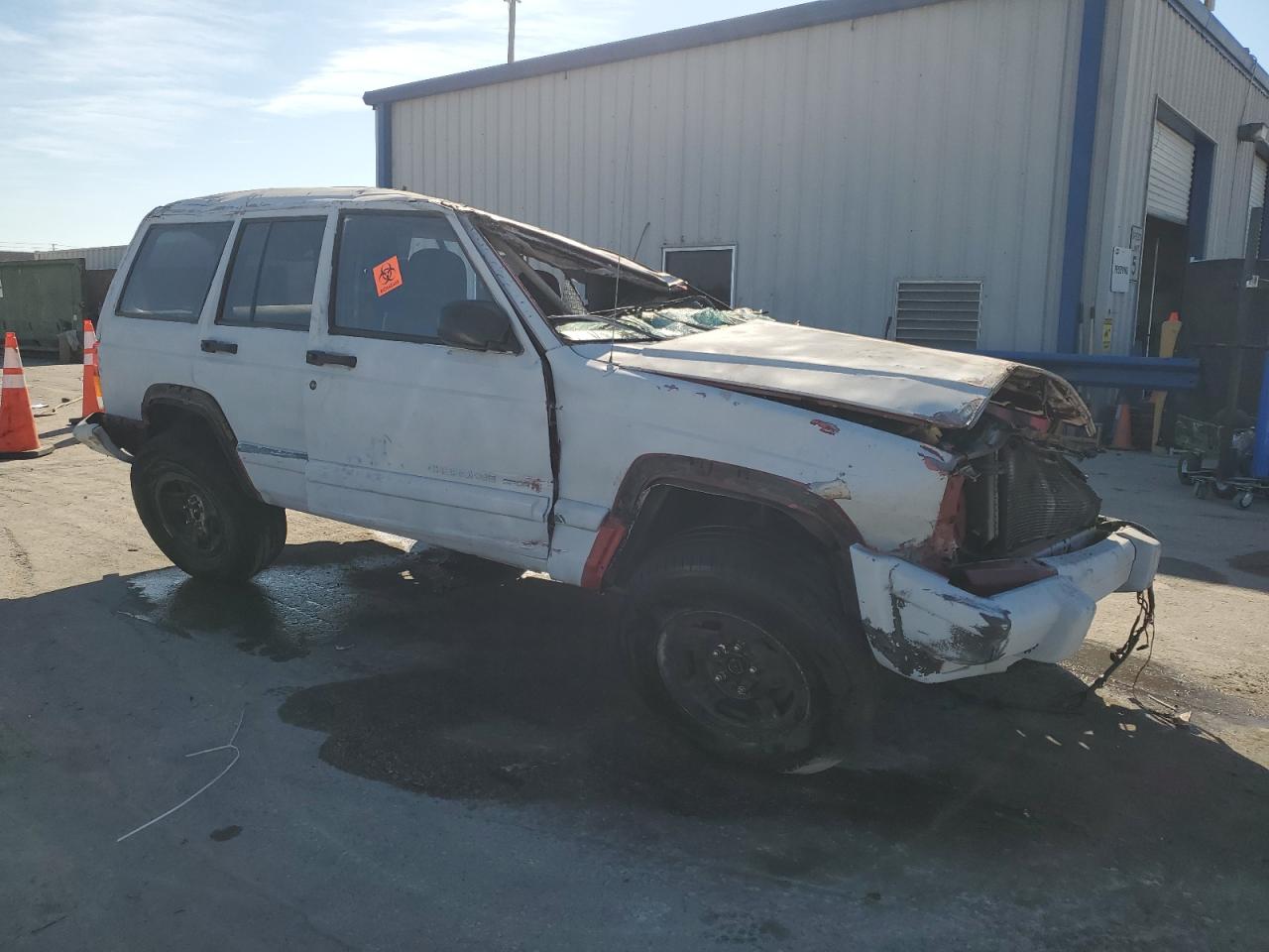 1999 Jeep Grand Cherokee VIN 1J4FT68S9XL667226 Copart auction photo, rollover damage thumbnail 4