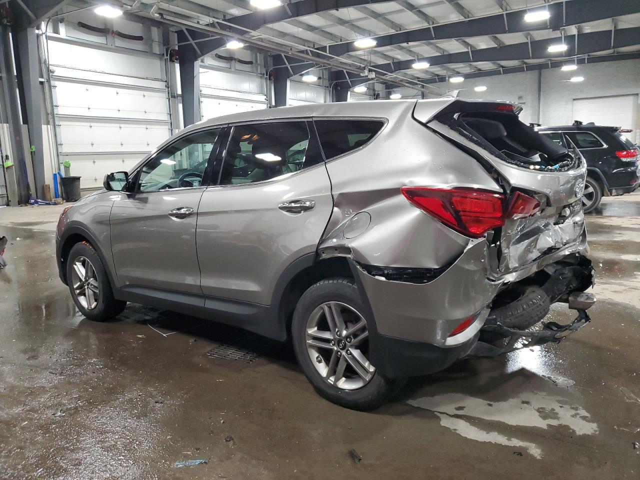 2017 Hyundai Santa Fe VIN 5NMZTDLB4HH003921 Copart auction photo, rear end damage thumbnail 2