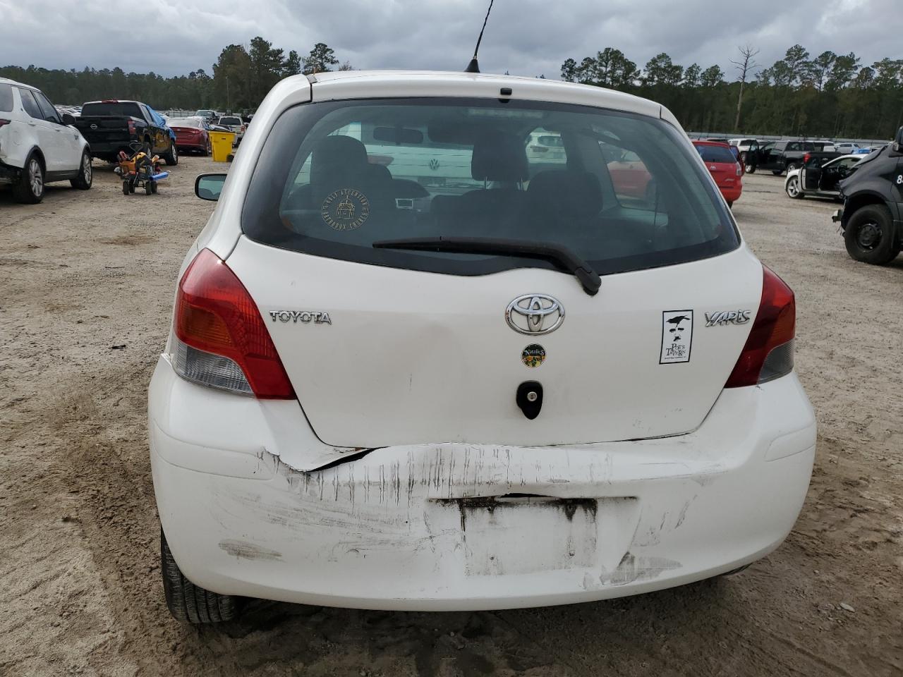 2009 Toyota Yaris VIN JTDJT903695244536 Copart auction photo, front end / rear end damage thumbnail 6