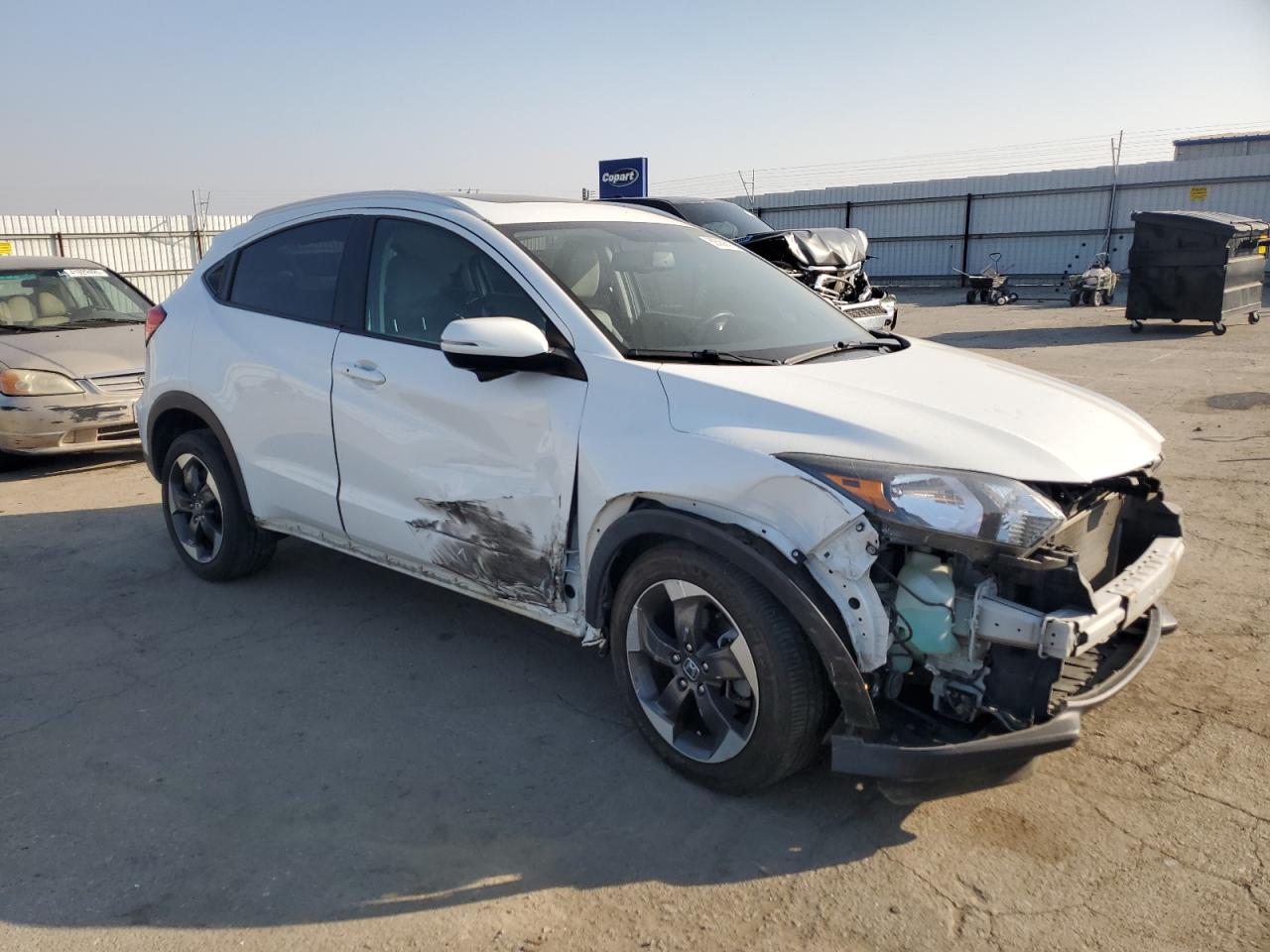 2018 Honda HR-V VIN 3CZRU6H76JM707726 Copart auction photo, side / front end damage thumbnail 4