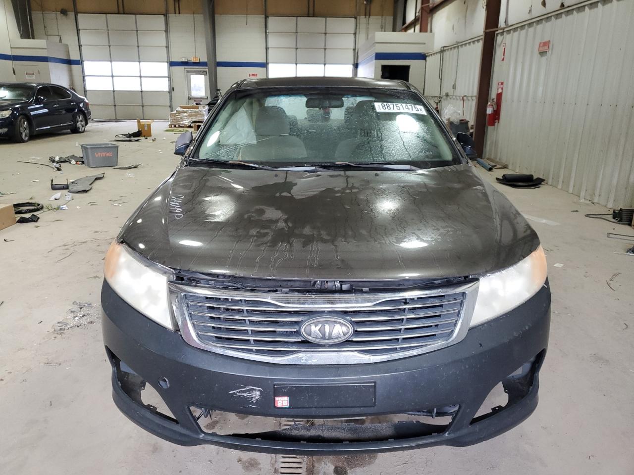 2009 KIA Optima VIN KNAGE228795301098 Copart auction photo, side damage thumbnail 5