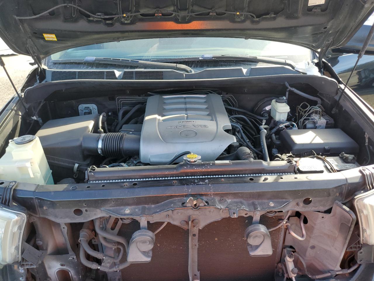 2010 Toyota Tundra VIN 5TFRM5F18AX001964 Copart auction photo, side / rear end damage thumbnail 12