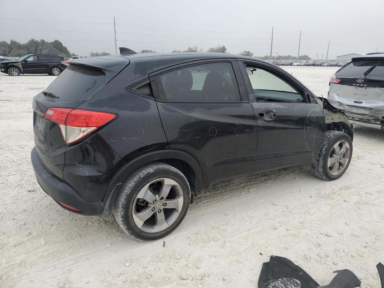 2019 Honda HR-V VIN 3CZRU5H37KG714336 Copart auction photo, front end / minor dent/scratches damage thumbnail 3