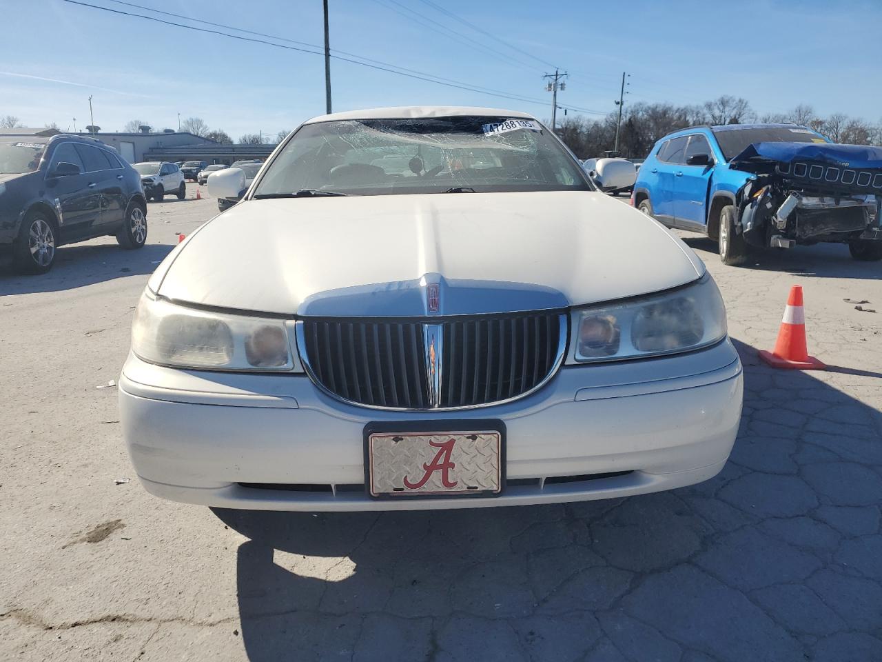 2000 Lincoln Town Car VIN 1LNHM82W2YY813274 Copart auction photo, top/roof damage thumbnail 5