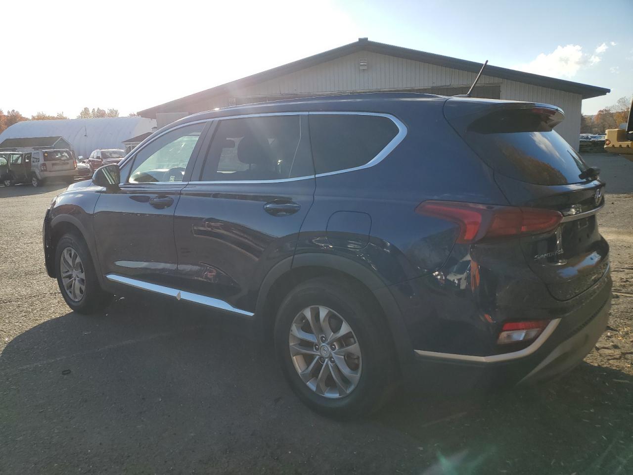 2020 Hyundai Santa Fe VIN 5NMS2CAD3LH240993 Copart auction photo, front end / minor dent/scratches damage thumbnail 2