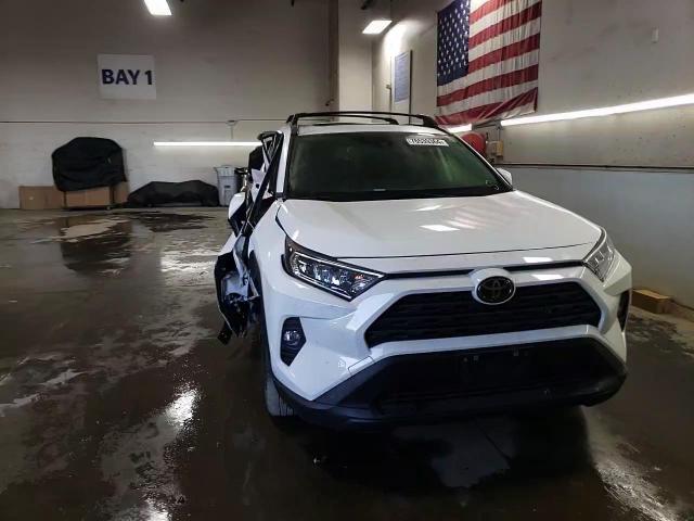 2020 Toyota RAV 4 VIN JTMA1RFVXLD052077 Copart auction photo, side / front end damage thumbnail 14