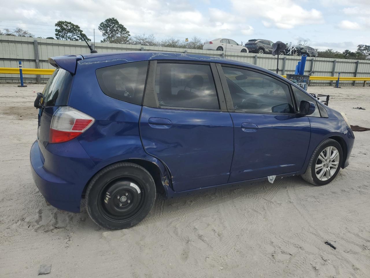 2011 Honda Fit VIN JHMGE8H51BC007229 Copart auction photo, side damage thumbnail 3