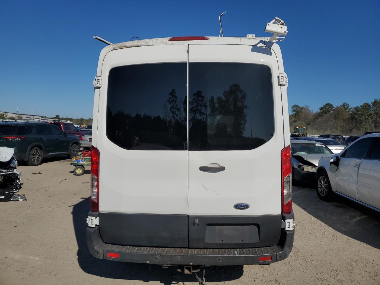 2016 Ford Transit VIN 1FTYR1CM9GKA82001 Copart auction photo, burn damage thumbnail 6