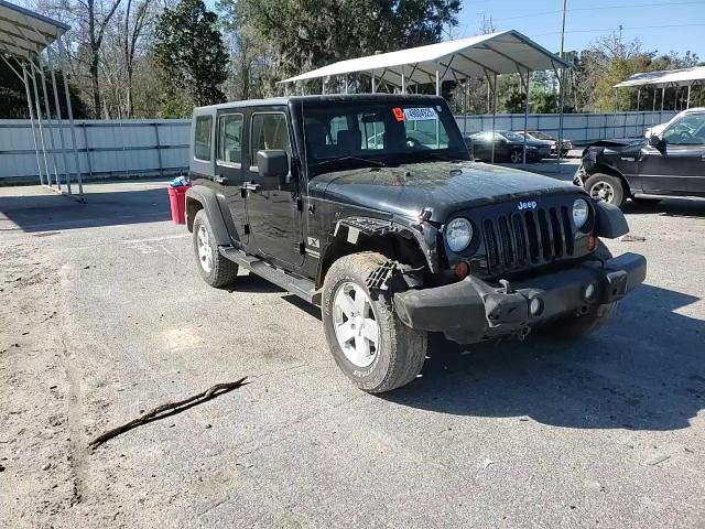 2009 Jeep Wrangler VIN 1J4GA391X9L788932 Copart auction photo, front end damage thumbnail 10