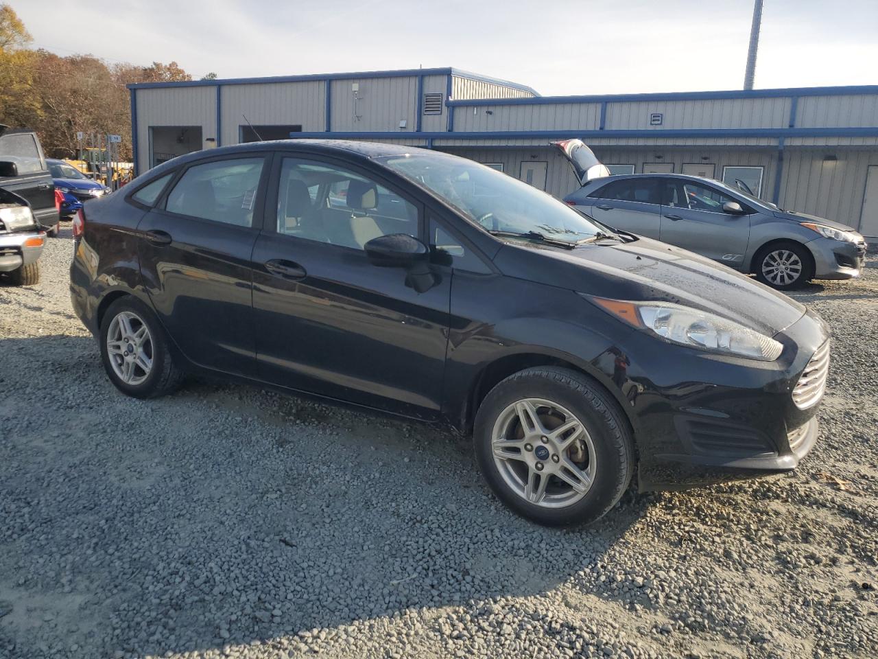 2018 Ford Fiesta VIN 3FADP4BJ6JM147521 Copart auction photo, all over damage thumbnail 4