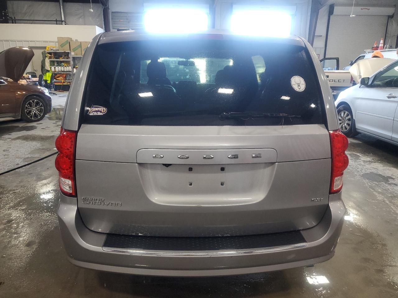 2014 Dodge Caravan VIN 2C4RDGCG7ER349506 Copart auction photo, side damage thumbnail 6