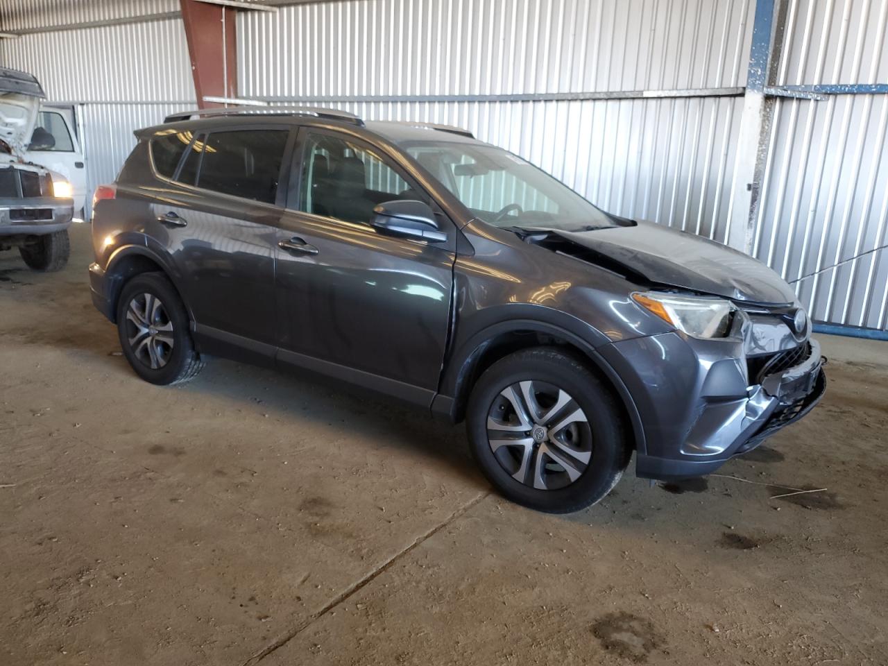 2017 Toyota RAV 4 VIN JTMZFREV7HJ138509 Copart auction photo, front end damage thumbnail 4
