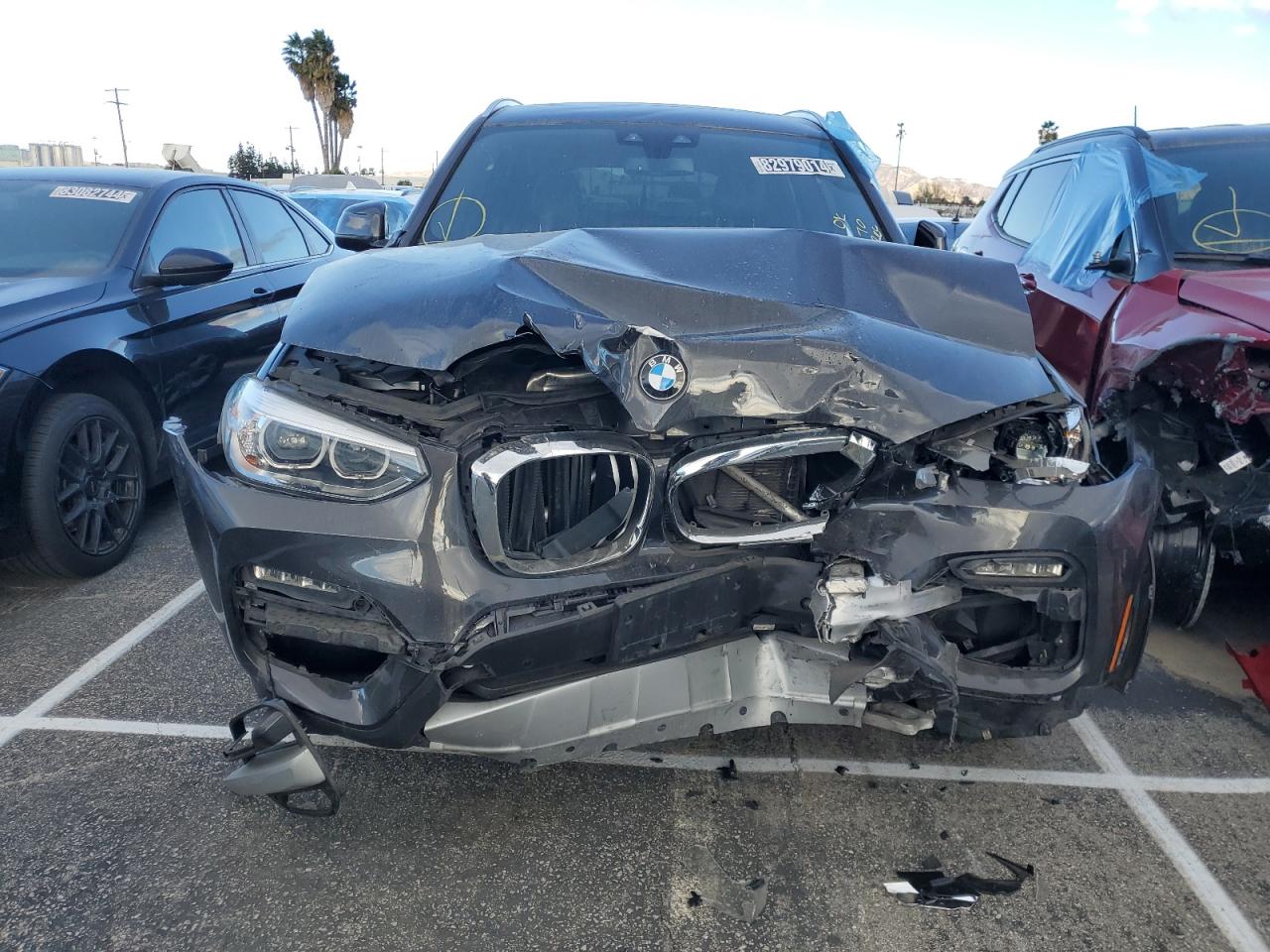 2020 BMW X3 VIN 5UXTY3C07L9B69811 Copart auction photo, front end / minor dent/scratches damage thumbnail 5