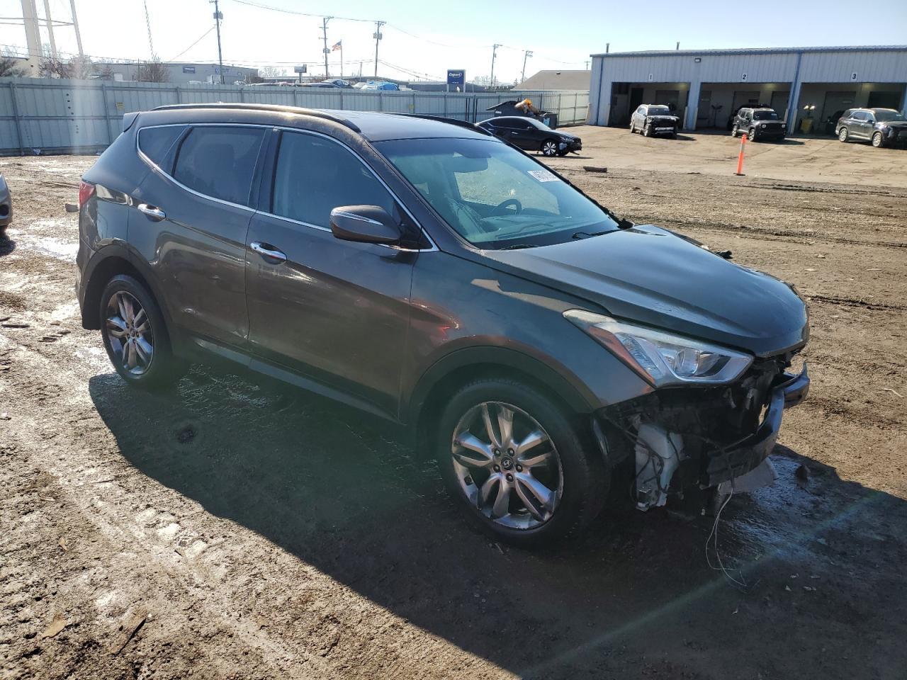 2013 Hyundai Santa Fe VIN 5XYZUDLA6DG025315 Copart auction photo, front end / all over damage thumbnail 4