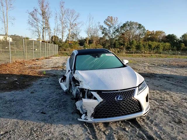 2022 Lexus RX VIN 2T2HGMDA0NC090011 Copart auction photo, side / front end damage thumbnail 10