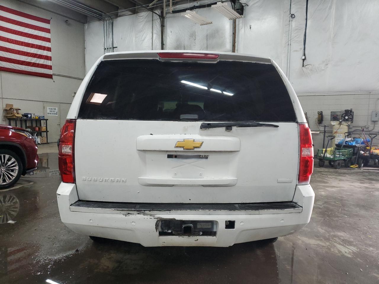 2012 Chevrolet Suburban VIN 1GNSKJE7XCR179086 Copart auction photo, vandalism / hail damage thumbnail 6