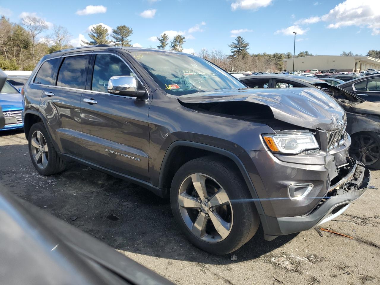 2014 Jeep Grand Cherokee VIN 1C4RJFBG7EC469917 Copart auction photo, front end / side damage thumbnail 4